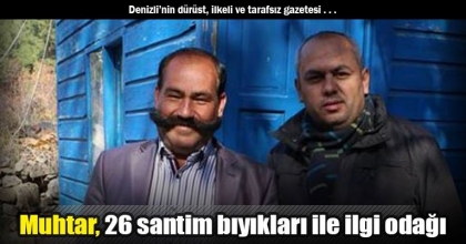 Muhtar, 26 santim bıyıkları ile ilgi odağı