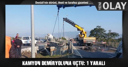 KAMYON DEMİRYOLUNA UÇTU: 1 YARALI