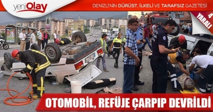 OTOMOBİL, REFÜJE ÇARPIP DEVRİLDİ: 4 YARALI