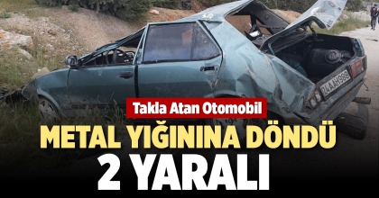 TAKLA ATAN OTOMOBİL  METAL YIĞININA DÖNDÜ: 2 YARALI 