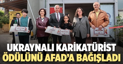 UKRAYNALI KARİKATÜRİST ÖDÜLÜNÜ AFAD’A BAĞIŞLADI