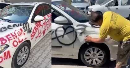 SAPLANTILI AŞIĞIN SPREY BOYAYLA AŞK DUVARINA DÖNDÜRDÜĞÜ OTOMOBİL TEMİZLENDİ  