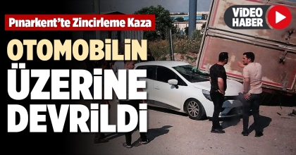 OTOMOBİLİN ÜZERİNE DEVRİLDİ  