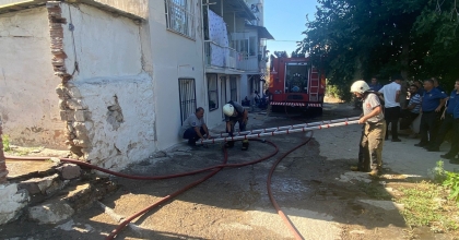 MAKİLİK ALANDAKİ YANGIN EVE SIÇRADI