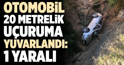 OTOMOBİL UÇURUMA YUVARLANDI: 1 YARALI