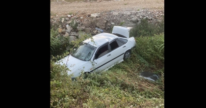 SÜRÜCÜ BELGESİ OLMADAN KULLANDIĞI OTOMOBİLLE KANALA UÇTU