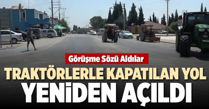 TRAKTÖRLERLE KAPATILAN YOL YENİDEN AÇILDI