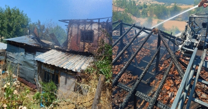 UŞAK'TA ÇIKAN YANGINDA EV VE TRAKTÖR ZARAR GÖRDÜ
