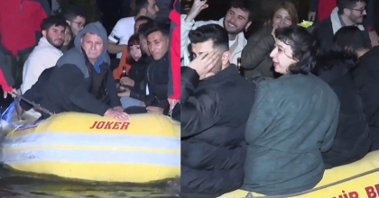 İZMİR'DE SELDE MAHSUR KALAN VATANDAŞLAR BOTLA KURTARILDI