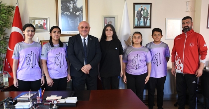 DERECEYE GİREN OKCULARDAN BAŞKAN ZİYARETİ