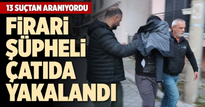 FİRARİ ŞÜPHELİ ÇATIDA YAKALANDI