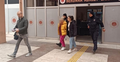 İZMİR'DE FUHUŞ EVİNE BASKIN