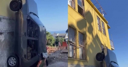 KAZAYA KARIŞAN ARACINI İPLE BİNADAN AŞAĞIYA SARKITTI