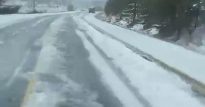 DOLU YAĞIŞI YOLLARI BEYAZA BÜRÜDÜ