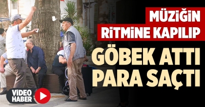 MÜZİĞİN RİTMİNE KAPILIP GÖBEK ATTI  PARA SAÇTI