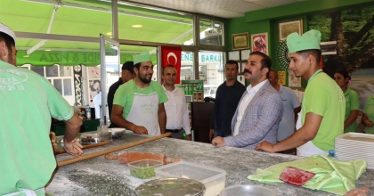 KOÇARLI KAYMAKAMI TAŞKIN İLÇE ESNAFI İLE BİR ARAYA GELDİ