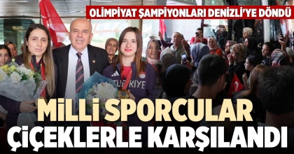 MİLLİ SPORCULAR ÇİÇEKLERLE KARŞILANDI