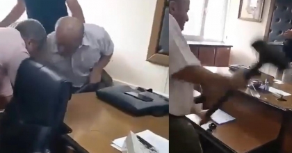 MÜDÜR ODASINA BALYOZLA DALIP MASAYI PARÇALADI