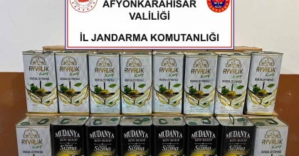 SAHTE ZEYTİNYAĞLARINI SATAMADAN JANDARMAYA YAKALANDI