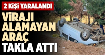 VİRAJI ALAMAYAN ARAÇ TAKLA ATTI