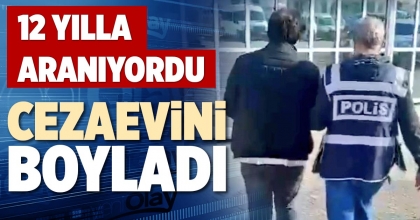 CEZAEVİNİ BOYLADI