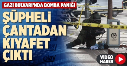 ŞÜPHELİ ÇANTADAN KIYAFET ÇIKTI
