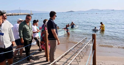 TURGUTREİS HALK PLAJINA RAYLI SİSTEM KURULDU