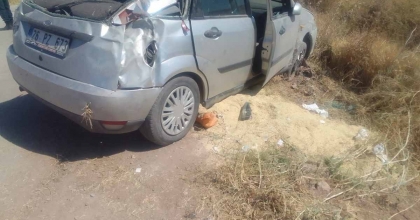 TARIM ARAZİSİNE DEVRİLEN OTOMOBİLDE 4 KİŞİ YARALANDI