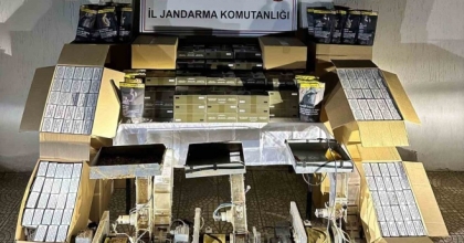 HALI YIKAMA DÜKKANI GÖRÜNÜMLÜ İŞ YERİNDE KAÇAK SİGARA İMALATI
