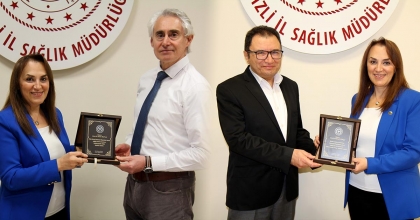 BAŞHEKİMLERE PLAKETLİ UĞURLAMA