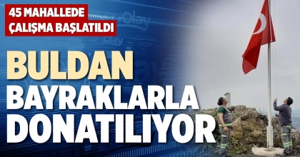 BULDAN BAYRAKLARLA DONATILIYOR