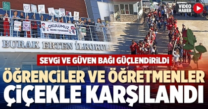 ÖĞRENCİLER VE ÖĞRETMENLER ÇİÇEKLE KARŞILANDI