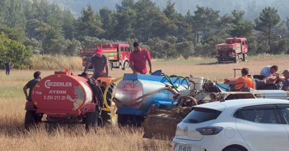 TRAKTÖRÜNÜ VE SU TANKERİNİ ALAN YANGINA KOŞTU
