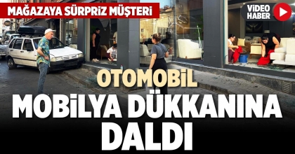 OTOMOBİL MOBİLYA DÜKKANINA DALDI