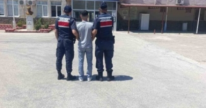 SİLAHLI YAĞMA SUÇUNDAN ARANIYORDU NAZİLLİ’DE YAKALANDI
