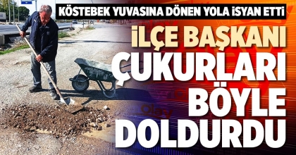 İLÇE BAŞKANI ÇUKURLARI BÖYLE DOLDURDU
