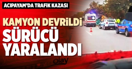 KAMYON DEVRİLDİ SÜRÜCÜ YARALANDI