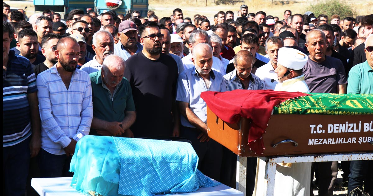 GÜNEY'İN KUNDAĞI MEZAR TAŞINA SARILDI